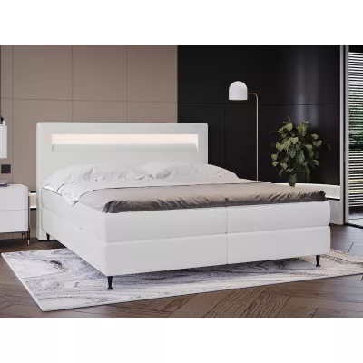 Hotelová posteľ s LED osvetlením 140x200 ORLANDO - biela ekokoža + topper ZDARMA