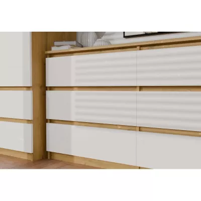 Široká šuplíková komoda TAAVI - dub artisan / biela