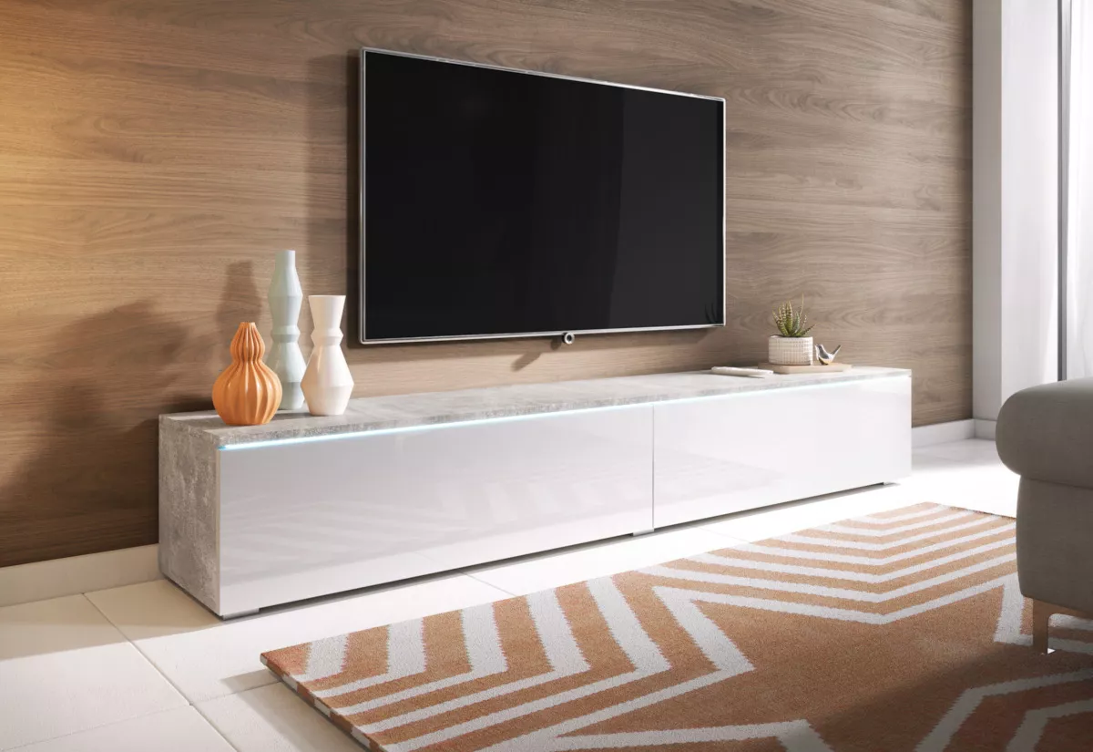 TV stolík Ceriee v kombinácii betónu a bieleho lesku postavený voľne na zemi