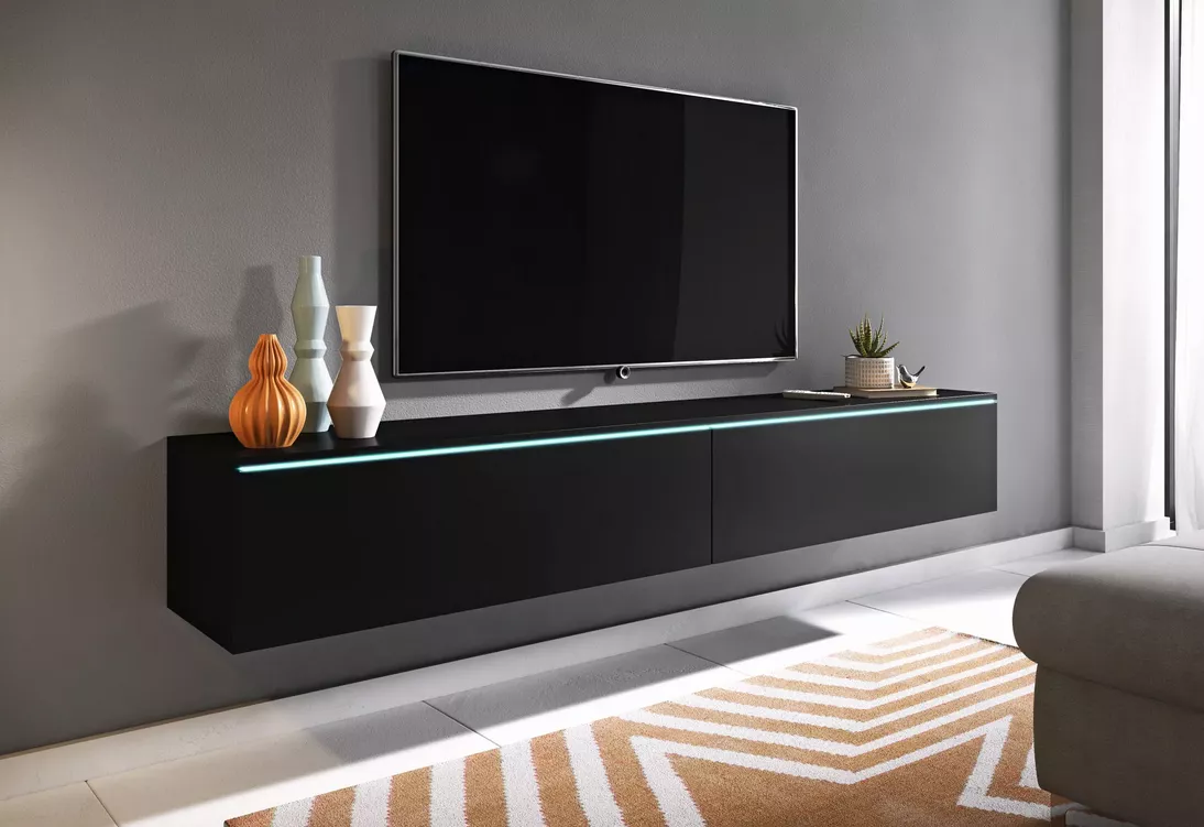 Ukážka montáže TV stolíka Ceriee so zavesením na stenu pod televíziu