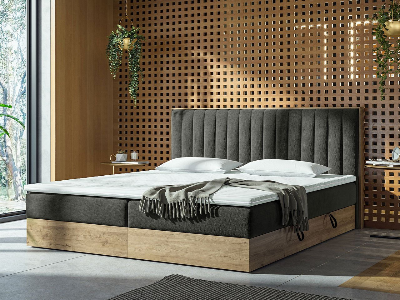 Priestranná drevená posteľ je optimálnym miestom na oddych